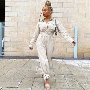 Model in white Boohoo suit