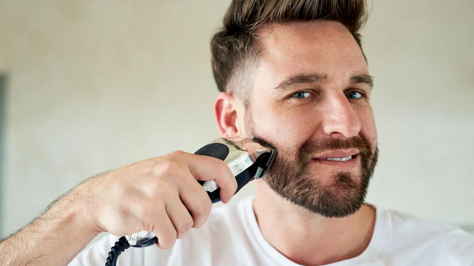 Man using a beard trimmer