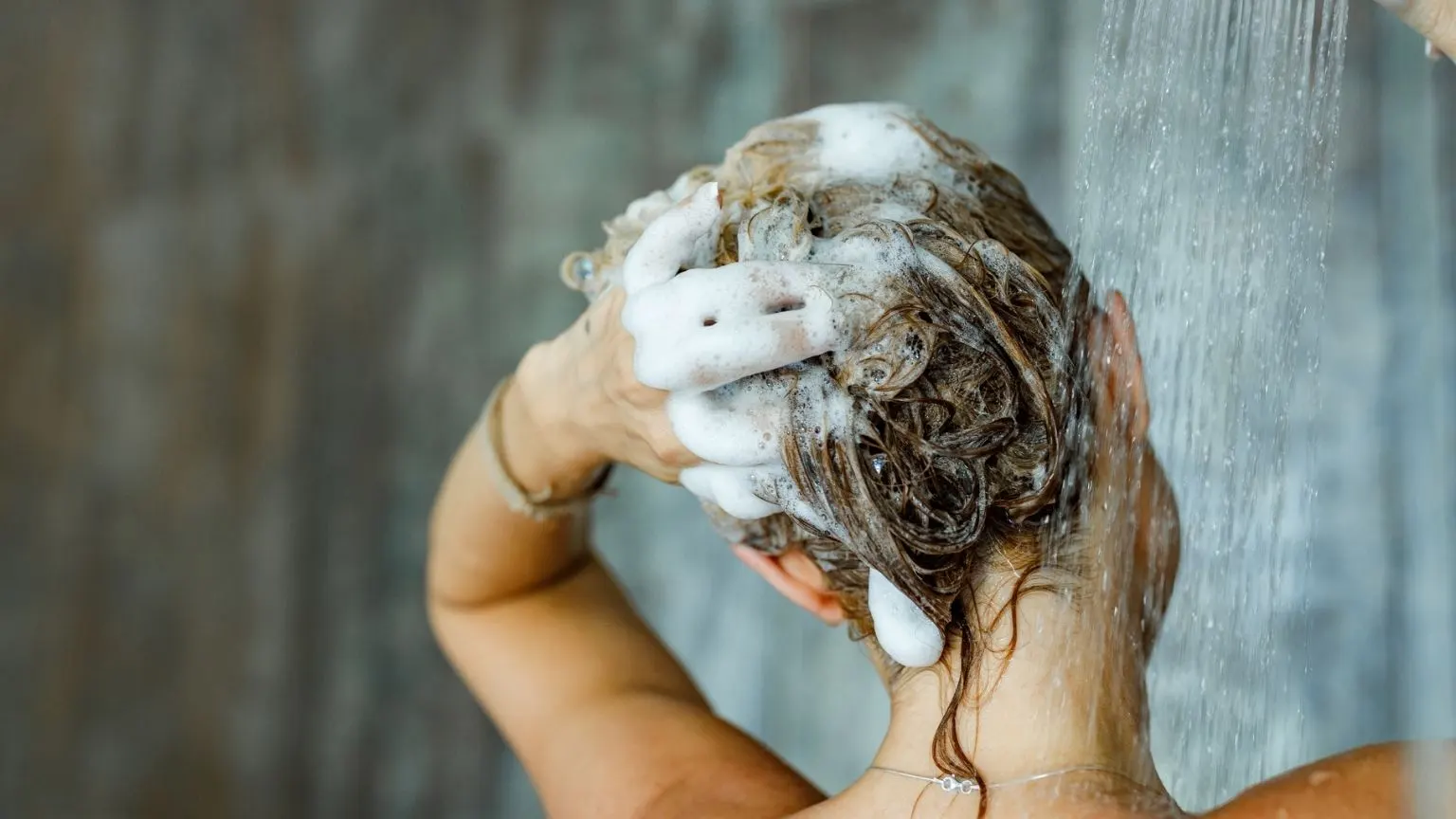 Washing hair with shampoo