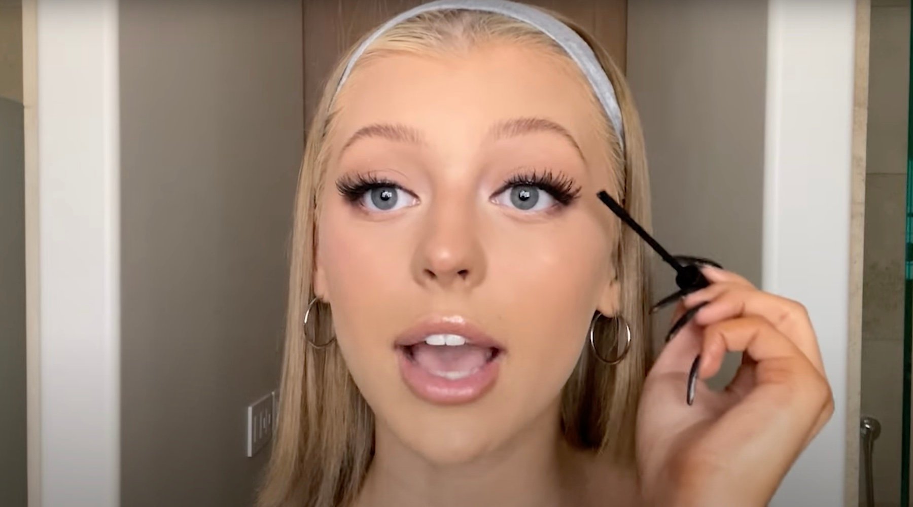 Loren Gray applying mascara in her Vogue Beauty Secrets video. 