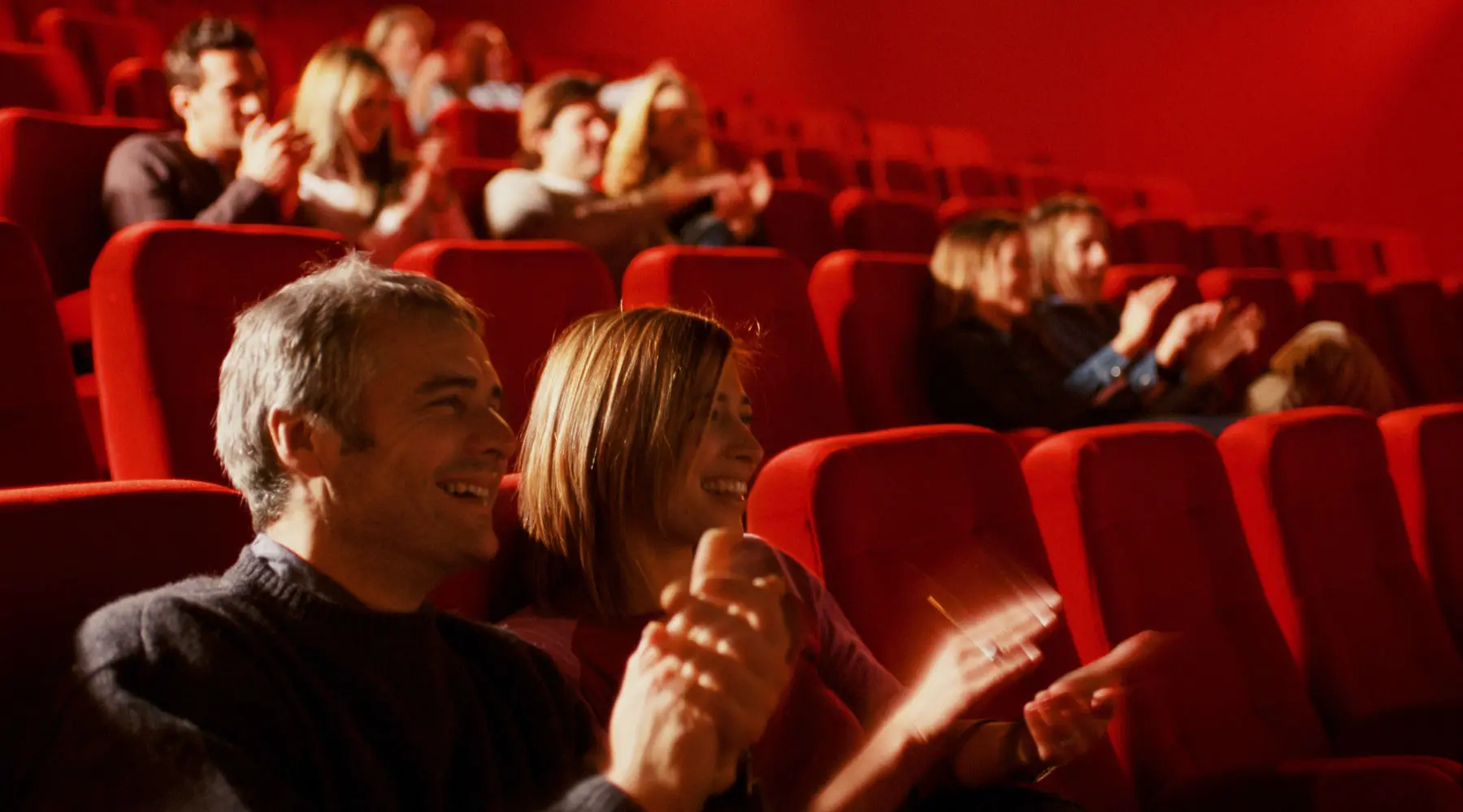 CROWD APPLAUDING in the cinema