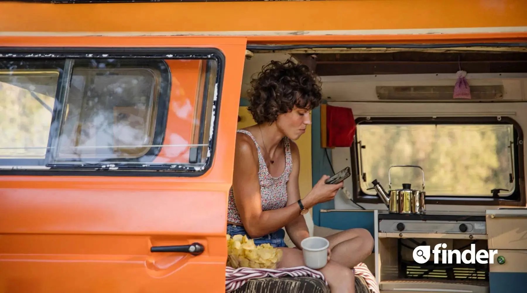 Woman-in-Campervan_Canva_1800x1000