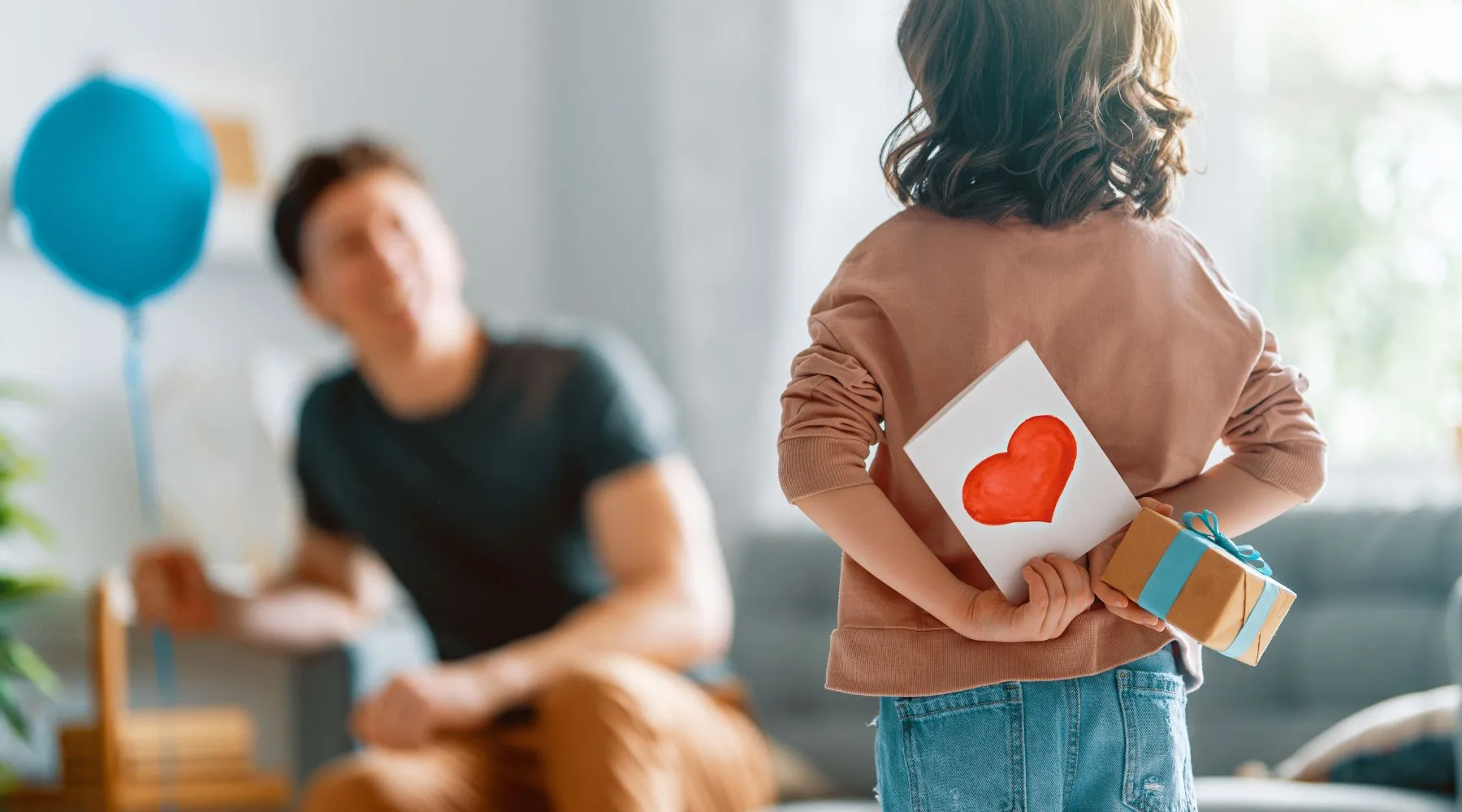 Father_Receiving_Gift_From_Son_Canva_1800x1000