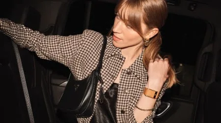 a woman wearing a whoop band on her wrist