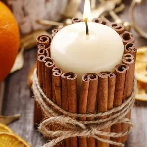Cinnamon sticks glued to candle from Stephanie Garden Therapy on Etsy